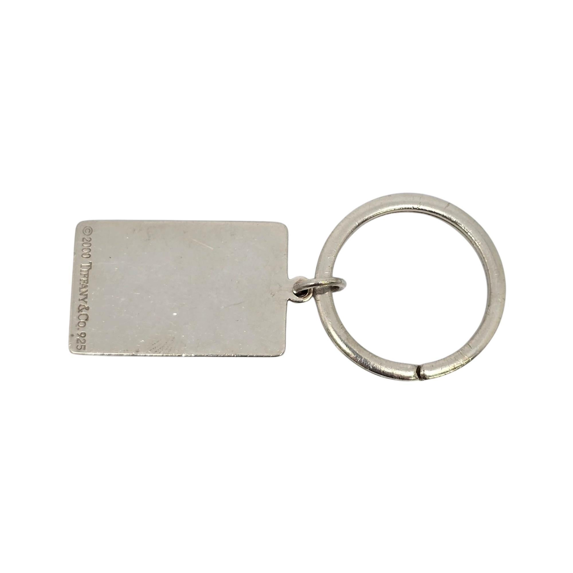 Sterling silver welcome mat keychain/key ring by Tiffany & Co.

Perfect for house keys, this Tiffany & Co key ring features a detailed Welcome mat charm. Tiffany & Co box and pouch are not included.

Measures approx 2 1/4