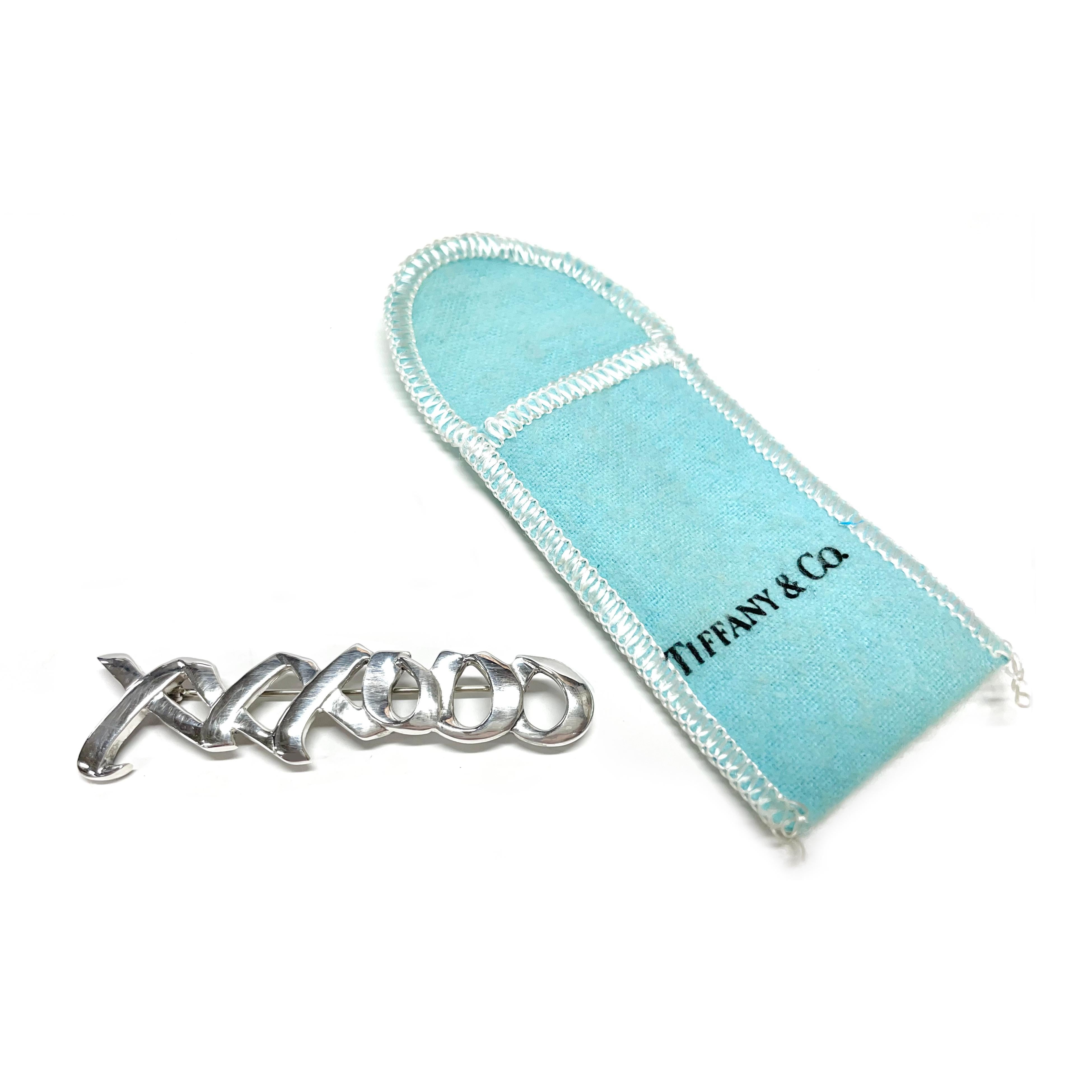 Contemporary Tiffany & Co. Sterling Silver XXXOOO Brooch For Sale