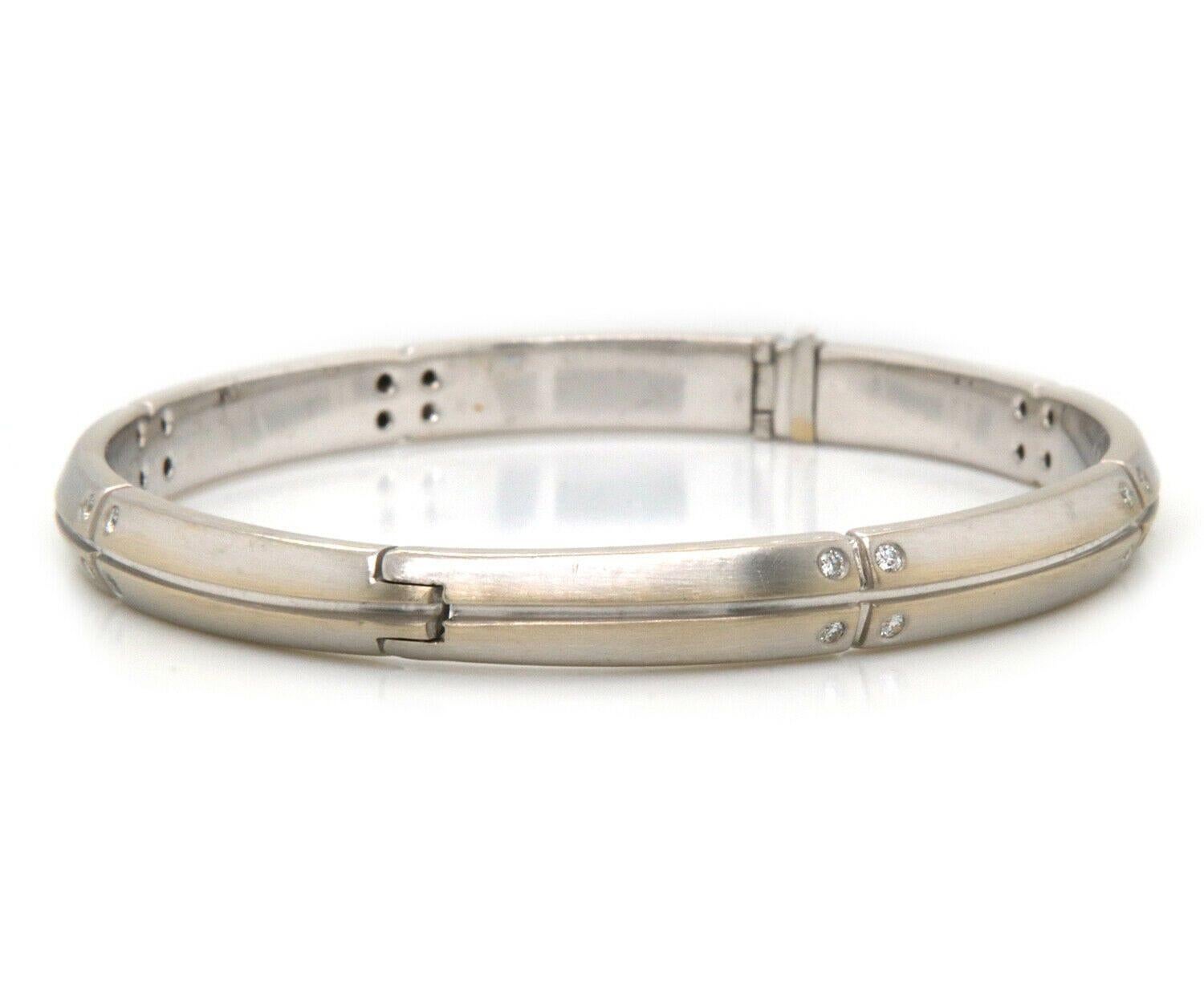 Tiffany & Co. Streamerica Diamond Bangle Bracelet in 18K

Tiffany & Co. Streamerica Diamond Bangle Bracelet
18K White Gold
Diamonds Carat Weight: Approx. 0.21ctw
Bracelet Width: Approx. 6.0 MM
Bracelet Length: Approx. 6.50 Inches
Weight: Approx.