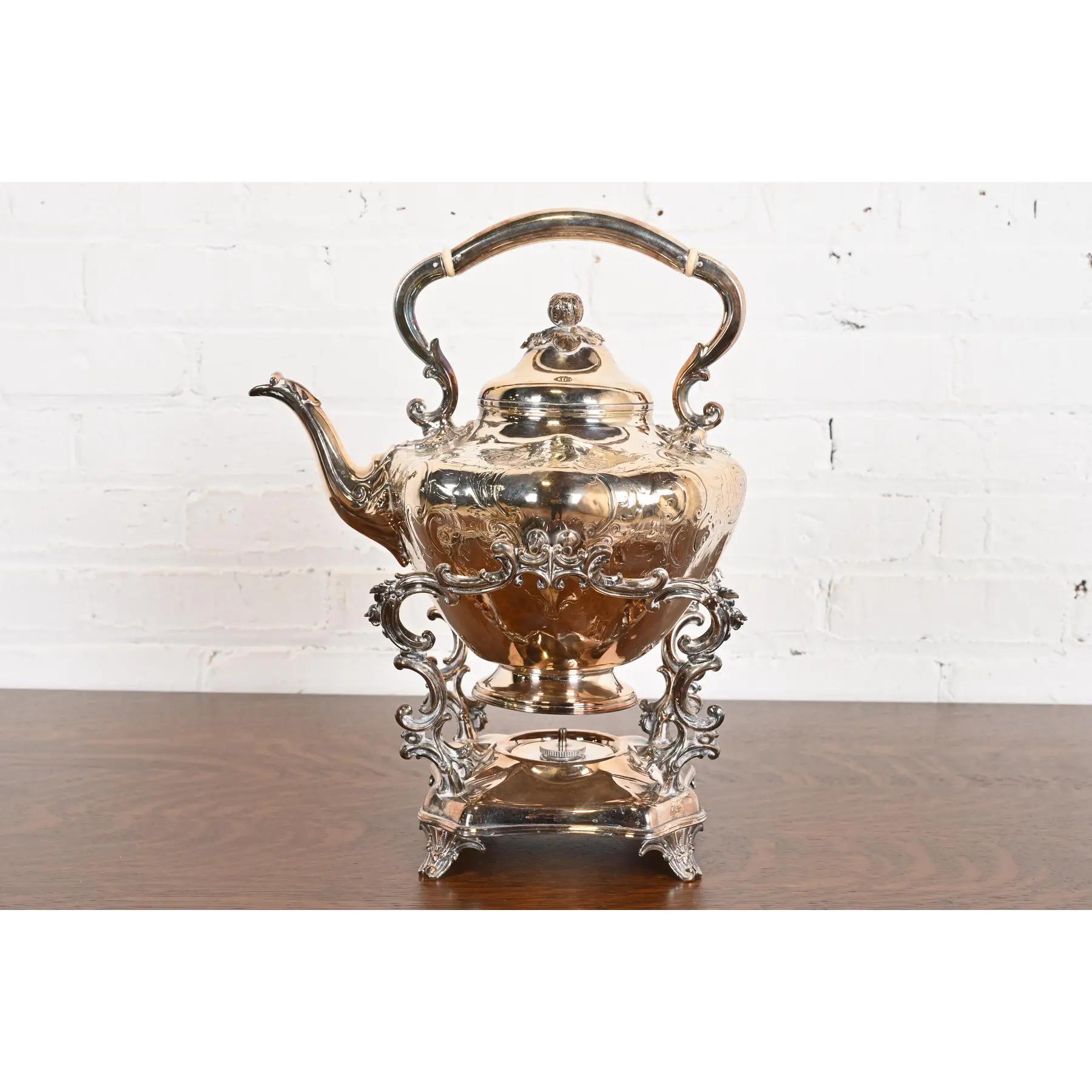 A gorgeous antique silverplate tea kettle or coffee pot with boiler

In the manner of Tiffany & Co.

USA, Late 19th Century

Measures:
Kettle : 9.25