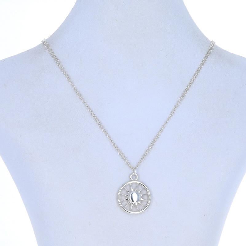 Brand: Tiffany & Co.
Design: Sun

Metal Content: Sterling Silver

Chain Style: Cable
Necklace Style: Double Strand Chain
Fastening Type: Lobster Claw Clasp
Theme: Celestial Compass, Sunburst

Measurements

Item 1: Pendant
Tall (from stationary