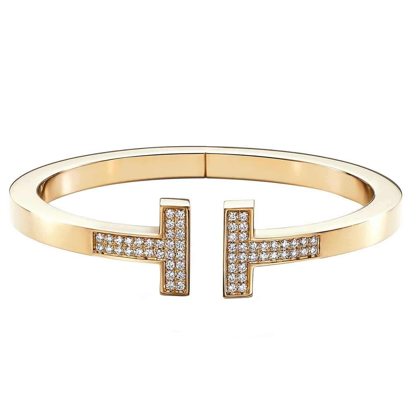 Pavé diamonds shine in this bold bracelet design. As multifaceted as it is iconic, the Tiffany T collection is a tangible reminder of the connections we feel but can't always see. Pair this diamond bracelet with other Tiffany T designs for a look