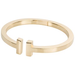 Tiffany & Co. T 18 Karat Yellow Gold Bangle