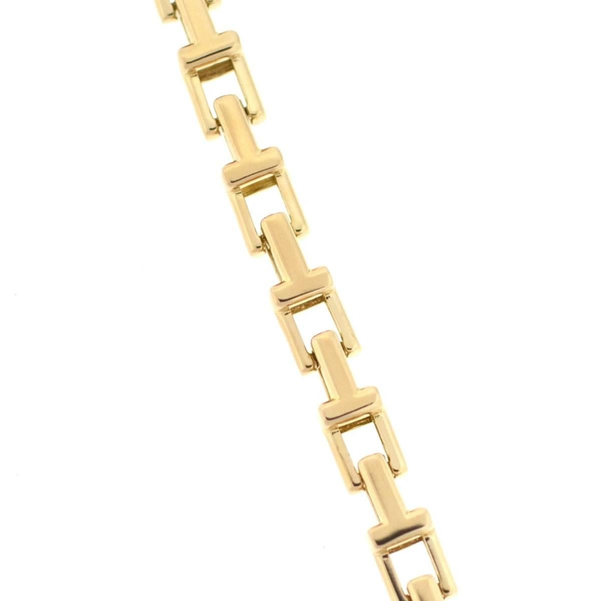 Company-Tiffany & Co.
Style- T  Chain Bracelet
Metal-18k Yellow Gold
Size-8