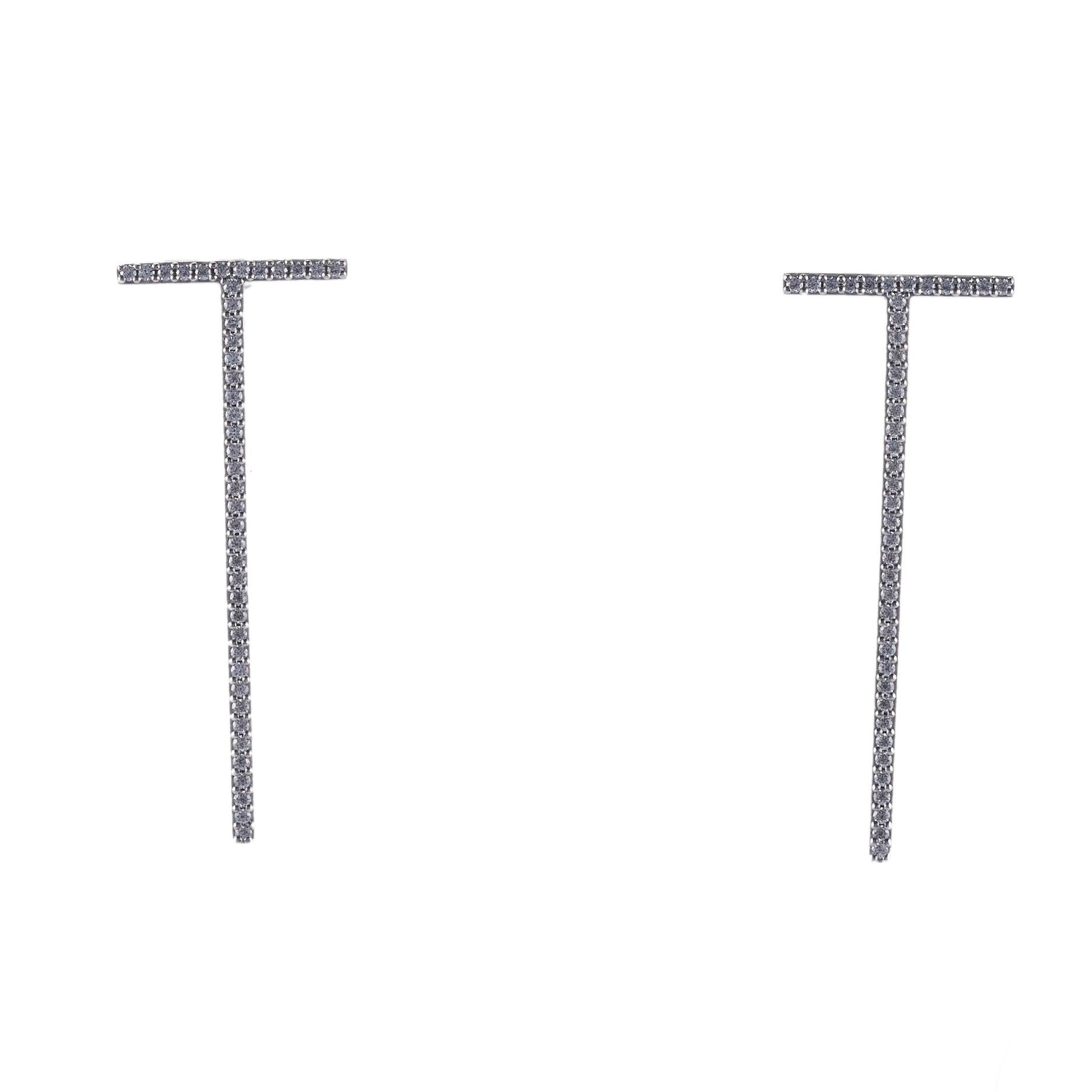 Tiffany & Co T collection earrings, set with approx. 0.46ctw in VS/G diamonds. Earrings measure 35mm x 14mm. Marked: T & Co, Au750. weight is 4.2 grams.