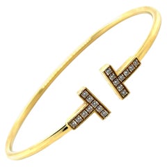 Tiffany 
Co T Diamond Wire Bracelet 18 Karat Yellow Gold