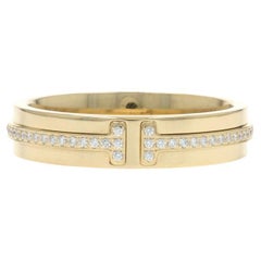 Tiffany 
Co. Bandeau étroit en or jaune 18k pour diamant rond .13ctw SZ 7 Ring