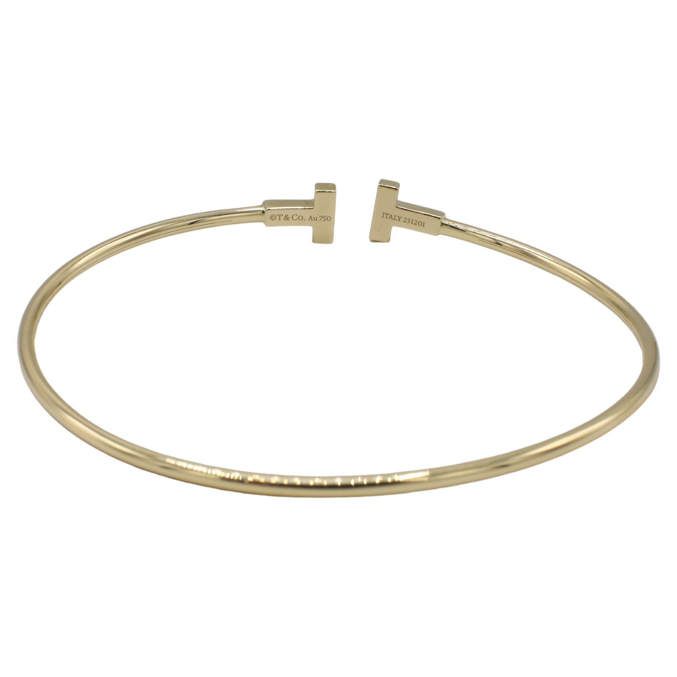 Modern Tiffany & Co. T. Narrow Wire 18 Karat Yellow Gold Bangle Bracelet For Sale
