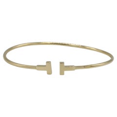 Tiffany & Co. T. Bracelet en or jaune 18 carats avec fil étroit