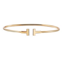 Tiffany & Co T Narrow Wire Bracelet Bangle in 18k Gold Medium Size