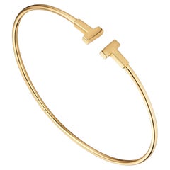 Tiffany & Co T Narrow Wire Bracelet Bangle in 18k Gold Medium Size