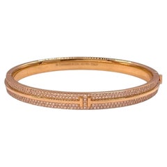 Tiffany & Co. Bracciale rigido con diamanti incastonati a pavé, oro rosa 18 carati, misura media