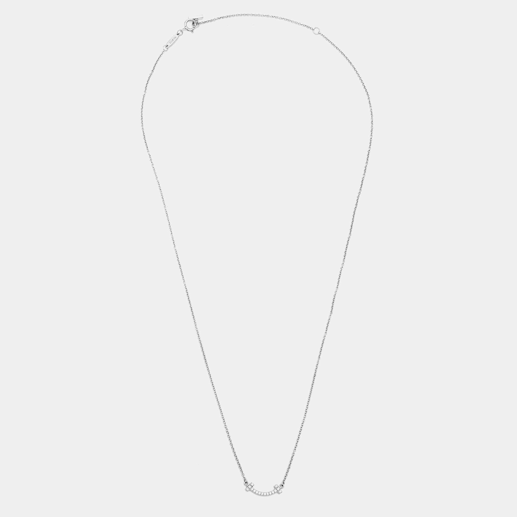 Define your neck with this Tiffany & Co. T Smile necklace. It is a masterfully crafted creation that promises to hold its beauty and value for a long time.


