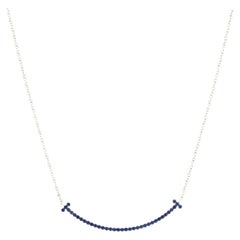 Tiffany & Co. T Smile Pendant Necklace 18k White Gold with Blue Sapphires Small