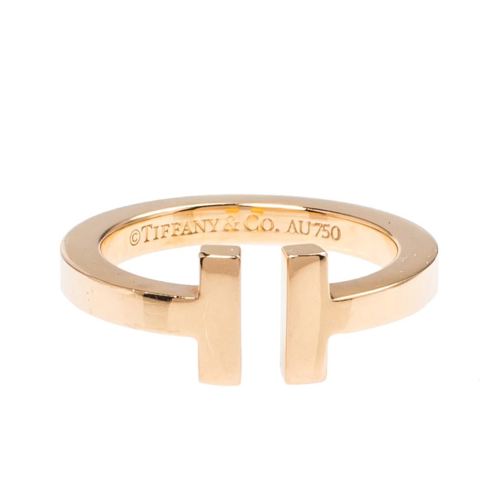 The Tiffany T collection by Tiffany & Co. is a celebrated jewelry line. Each piece comes with a distinct shape that boasts of fabulous style and structure. This ring is sculpted from 18k rose gold and designed in an open style with the letter 'T' on