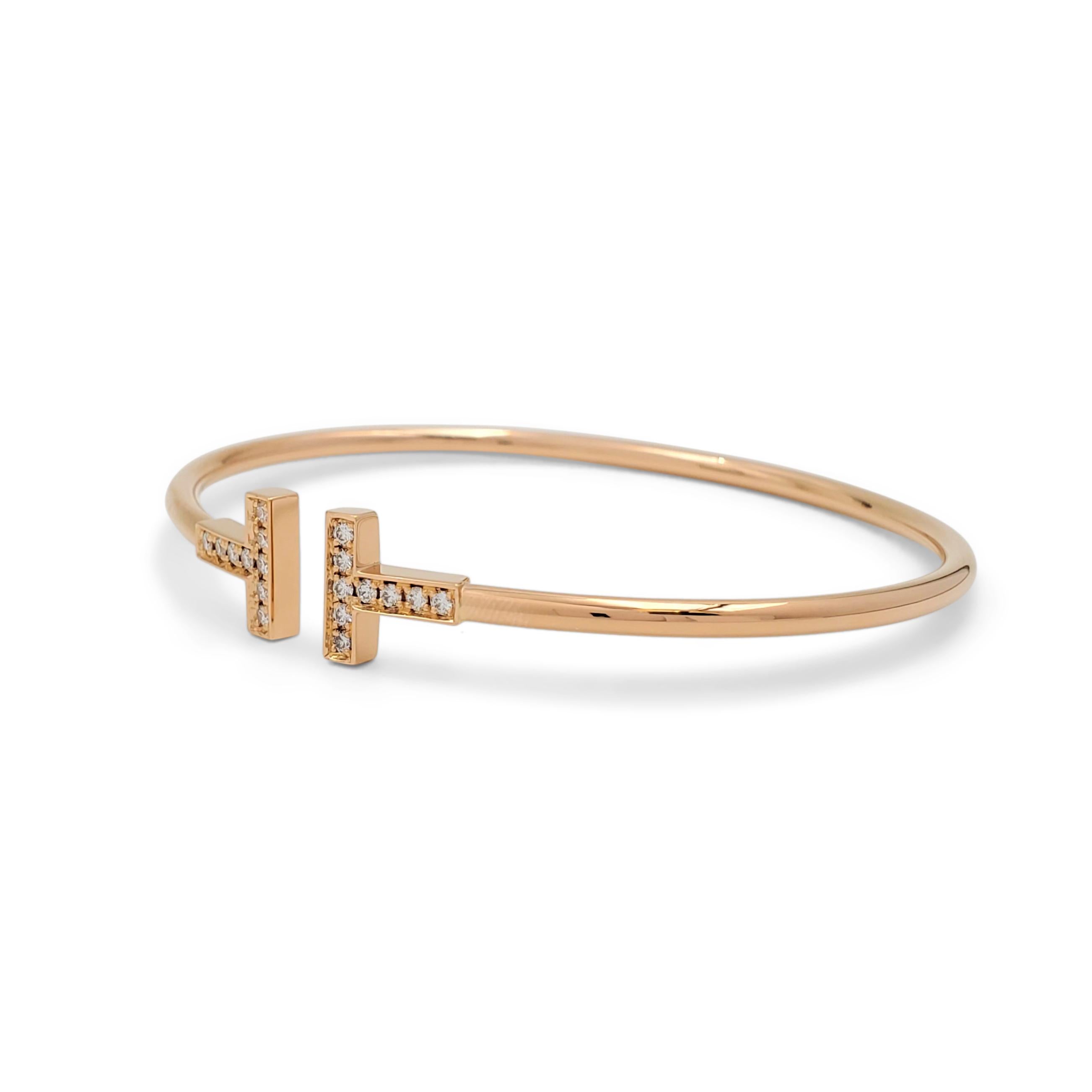 Authentic timeless Tiffany & Co. 'T Square' wire bracelet, inspired by the strong, clean lines of the letter T. Crafted in 18 karat rose gold and set with an estimated 0.22 carats of round brilliant cut diamonds. Signed T&Co., Au750. The bracelet is