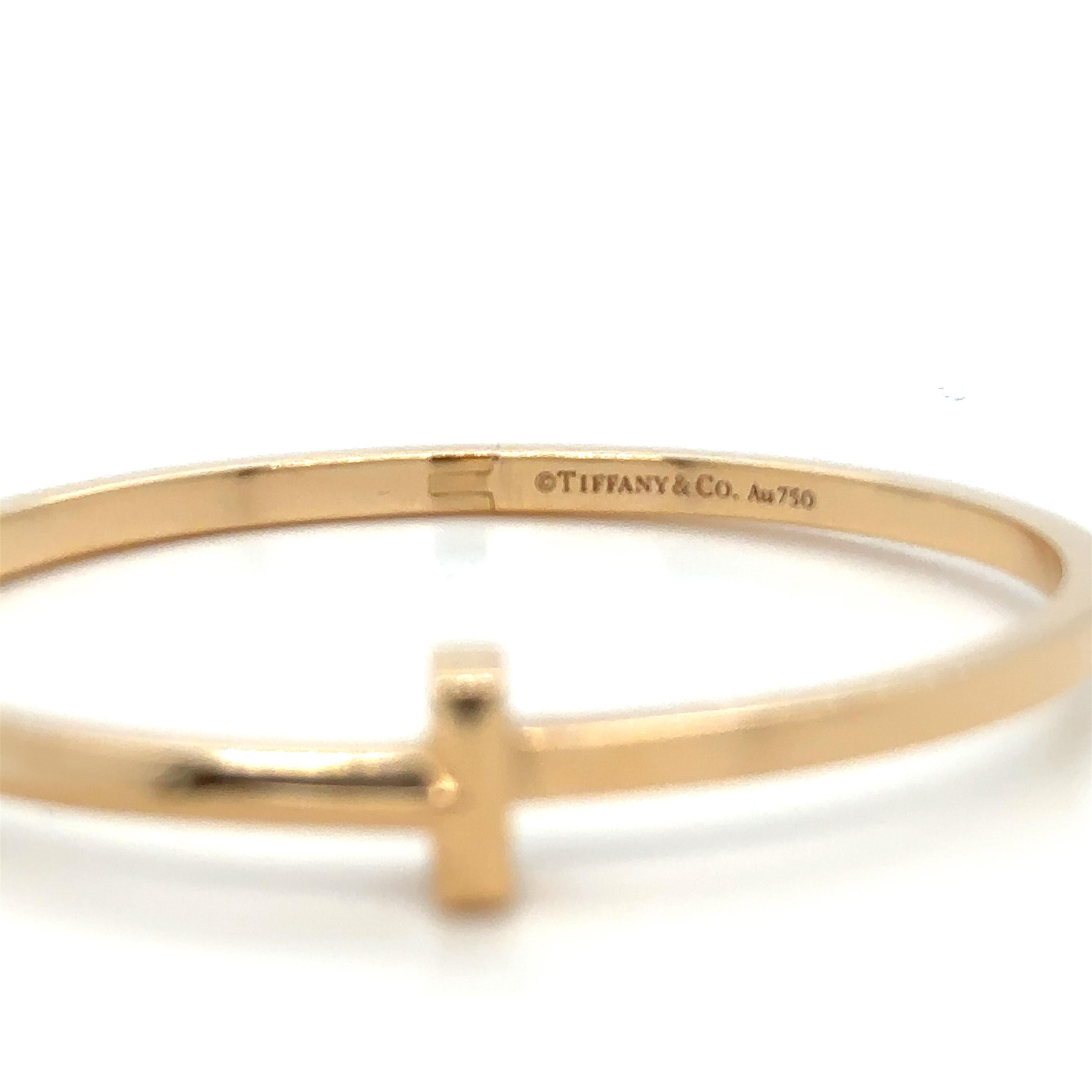 Unique features: 
Wrapped around the wearer in a continuous, unbroken circle, this narrow hinged bangle features a strong 
