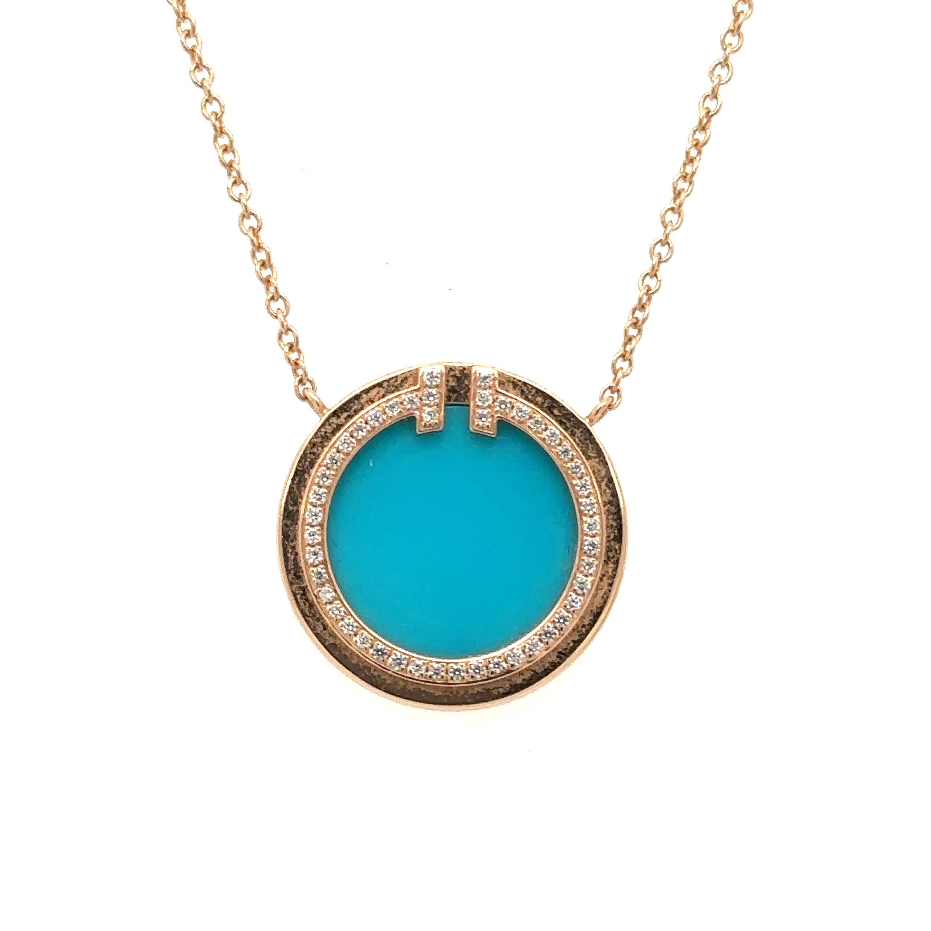 Item Details: This pendant from Tiffany & Co's T collection features a beautiful blue turquoise disc and accent diamonds. It is a modern item from the 2000s and has the most beautiful contrast color combination. The hues of turquoise sit beautifully