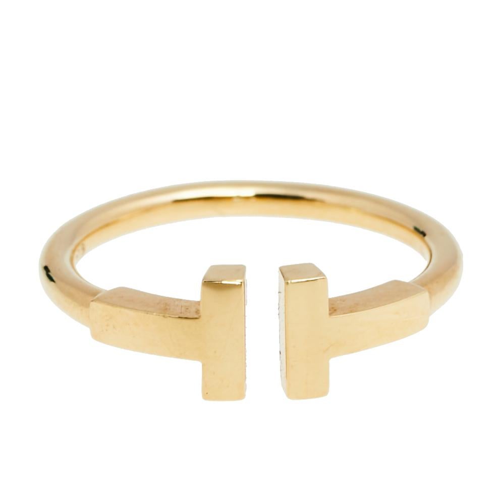 The Tiffany T collection is one of the most popular jewelry lines from Tiffany & Co. Each piece comes with a distinct shape that displays or re-interprets the 'T' symbol. This Tiffany T Wire ring is crafted from 18K yellow gold and styled as a