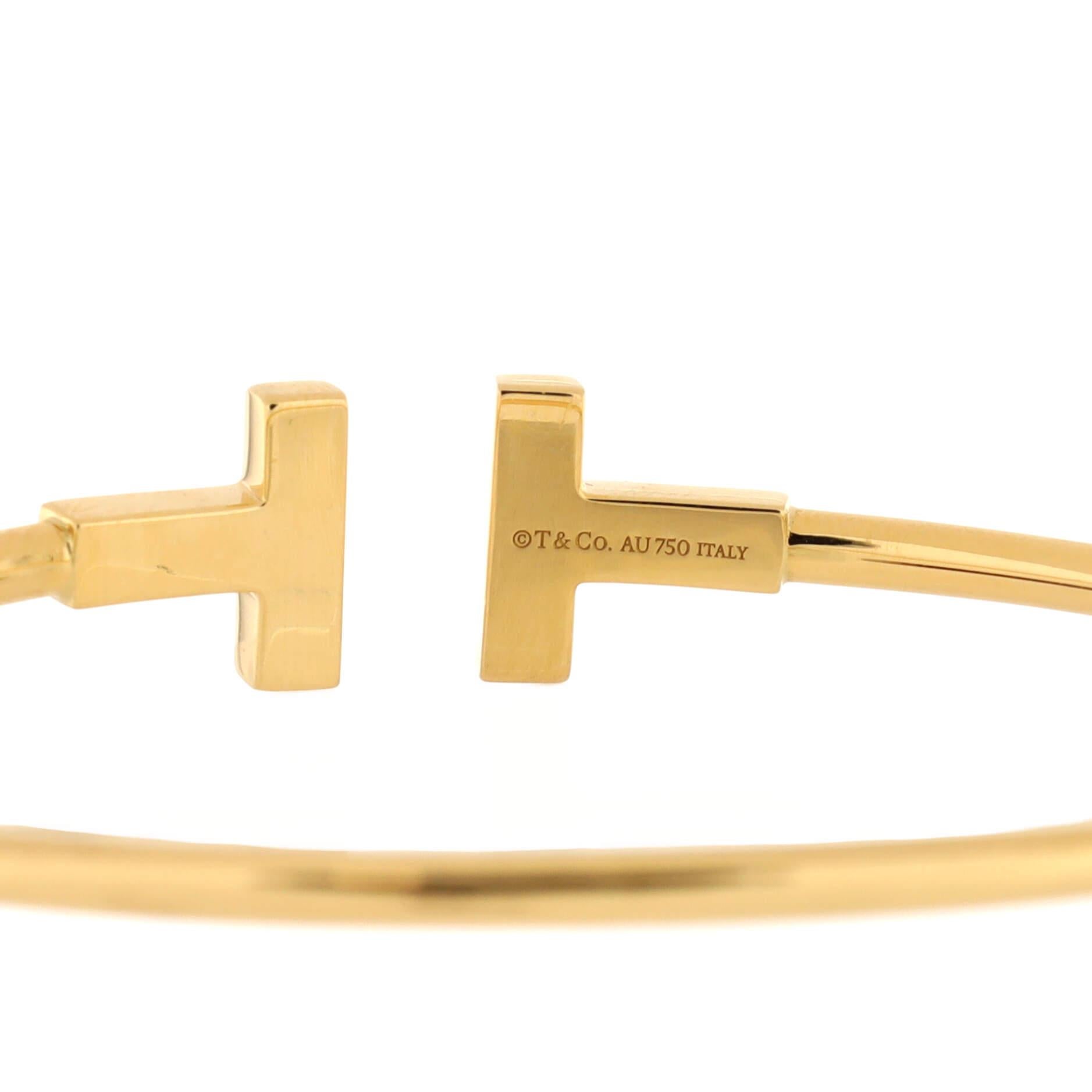 Tiffany & Co. T Wire Bracelet 18k Yellow Gold and Diamonds In Good Condition In New York, NY