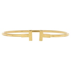 Tiffany & Co. Bracciale a T in oro giallo 18K stretto