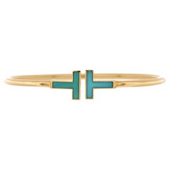 Tiffany & Co. Bracelet en fil métallique T en or jaune 18 carats avec turquoise