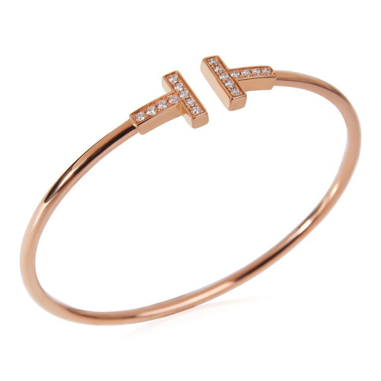 Tiffany & Co. T Wire Diamond Bracelet in 18K Rose Gold

PRIMARY DETAILS
SKU: 118356
Listing Title: Tiffany & Co. T Wire Diamond Bracelet in 18K Rose Gold
Condition Description: Retails for 4200 USD. In excellent condition and recently polished. Will