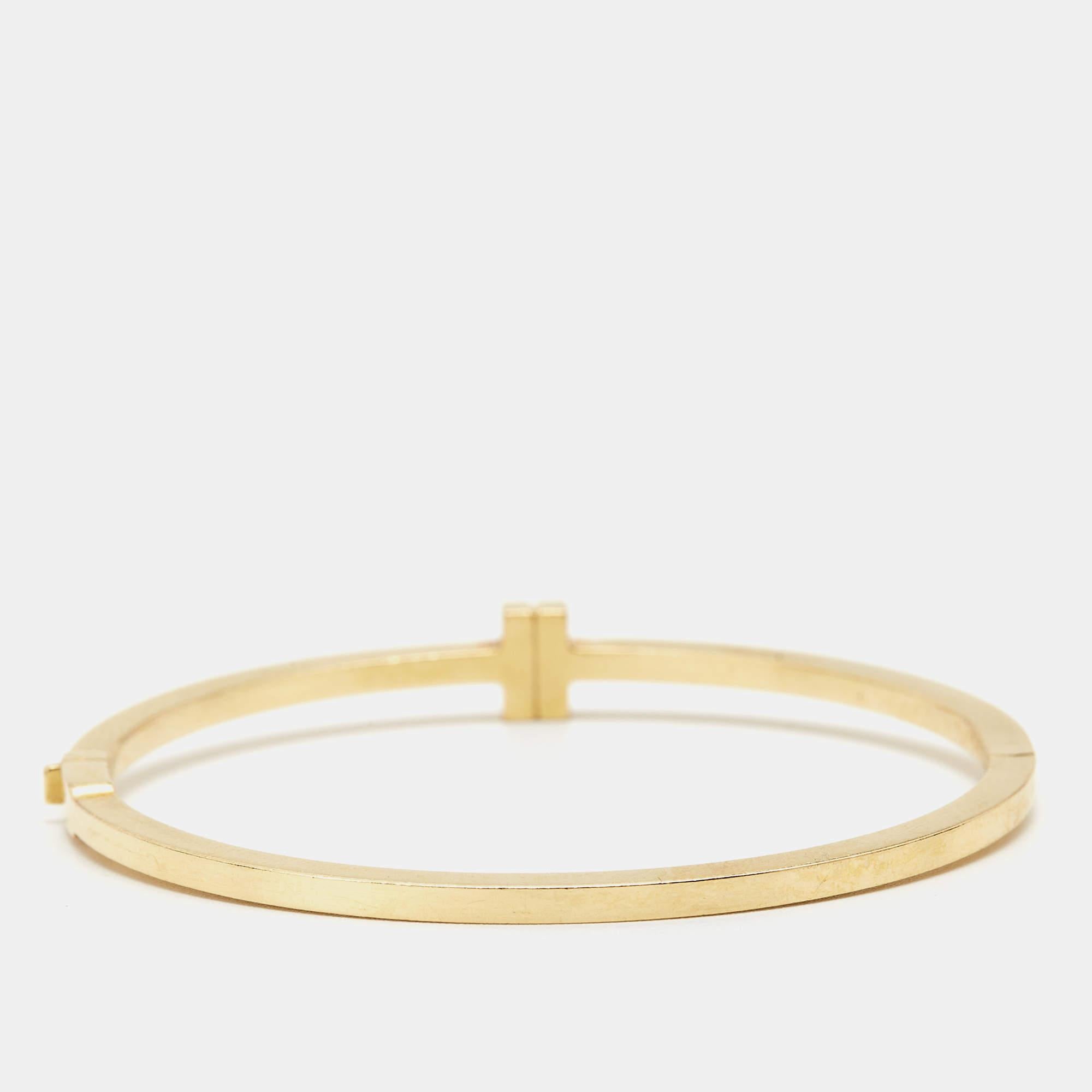 The Tiffany T collection by Tiffany & Co. has been inspired by the city of New York. Each piece comes with a distinct shape that boasts fabulous style and structure. This T Wire bracelet is crafted from 18K yellow gold and styled as a wire-like band