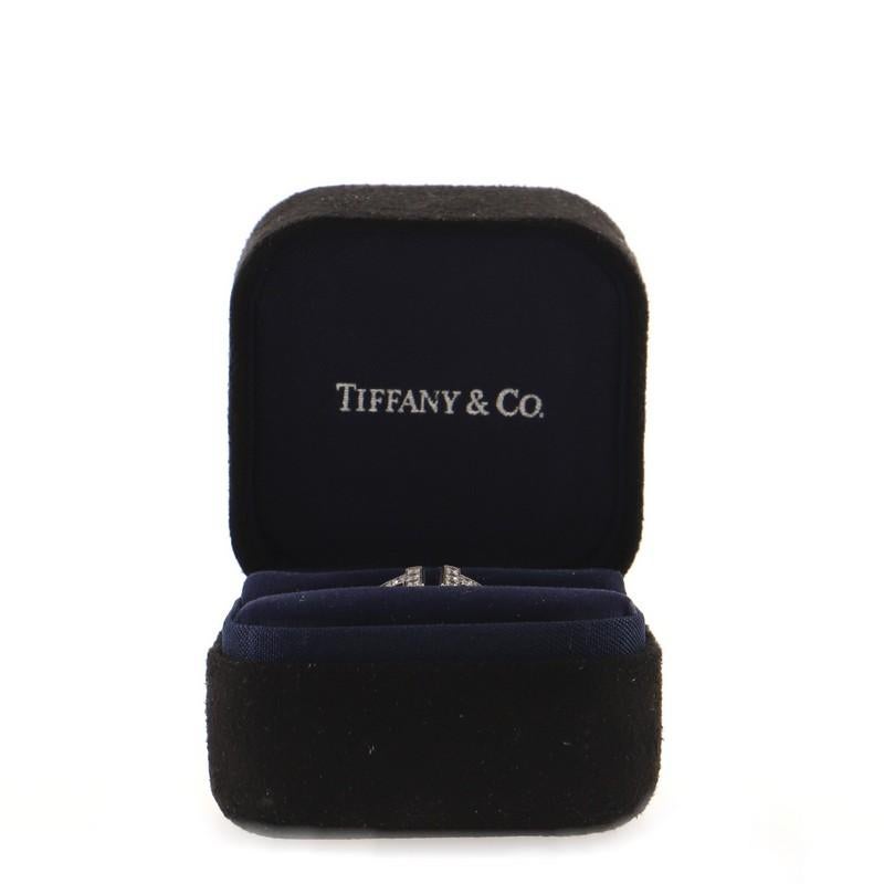 Condition: Very good. Moderate wear throughout.
Accessories: No Accessories
Measurements: Size: 6, Width: 1.70 mm
Designer: Tiffany & Co.
Model: T Wire Ring 18K White Gold with Diamonds
Exterior Color: White Gold
Item Number: 87615/2