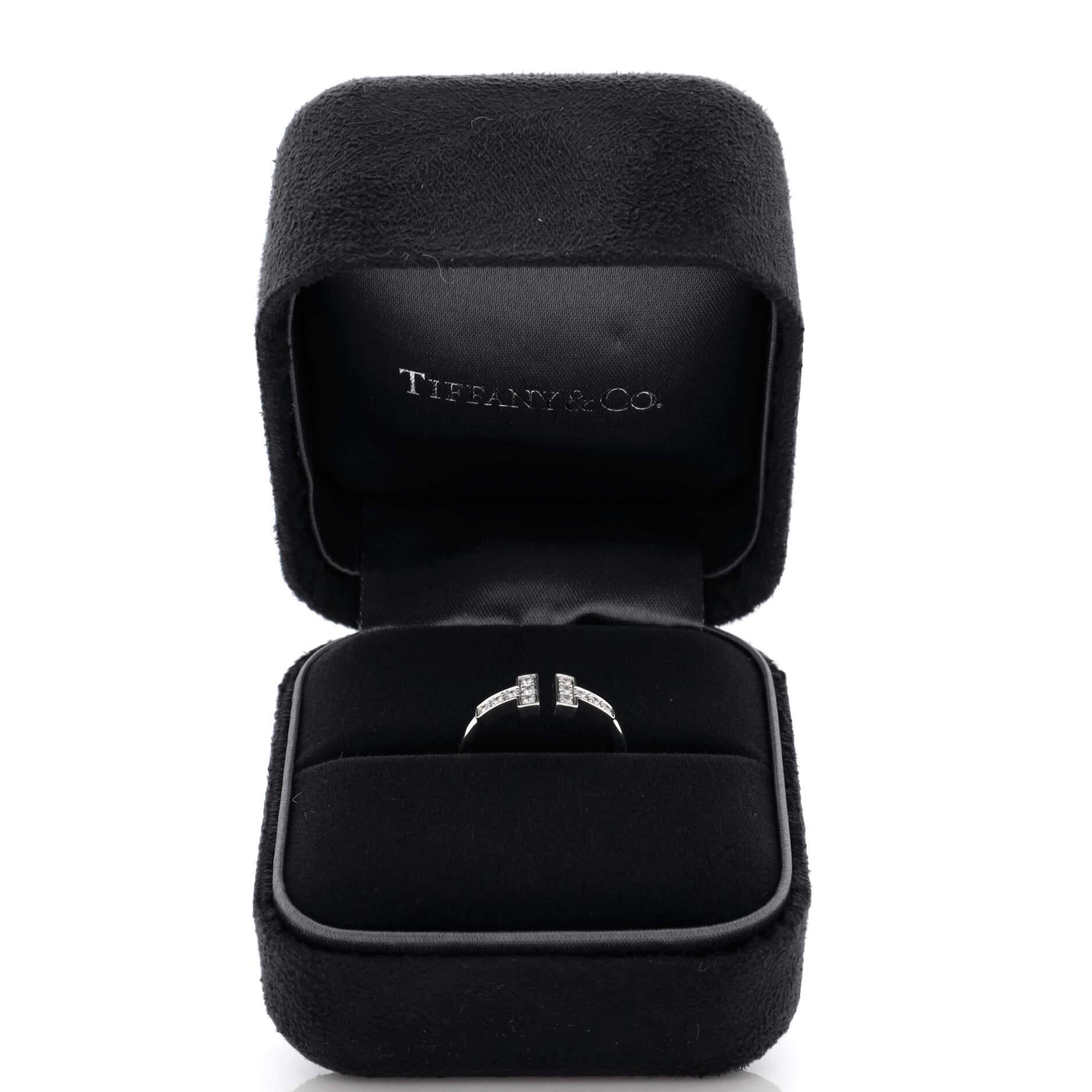 Condition: Great. Minor wear throughout.
Accessories:
Measurements: Size: 5.5, Width: 1.60 mm
Designer: Tiffany & Co.
Model: T Wire Ring 18K White Gold with Diamonds
Exterior Color: White Gold
Item Number: 224637/18