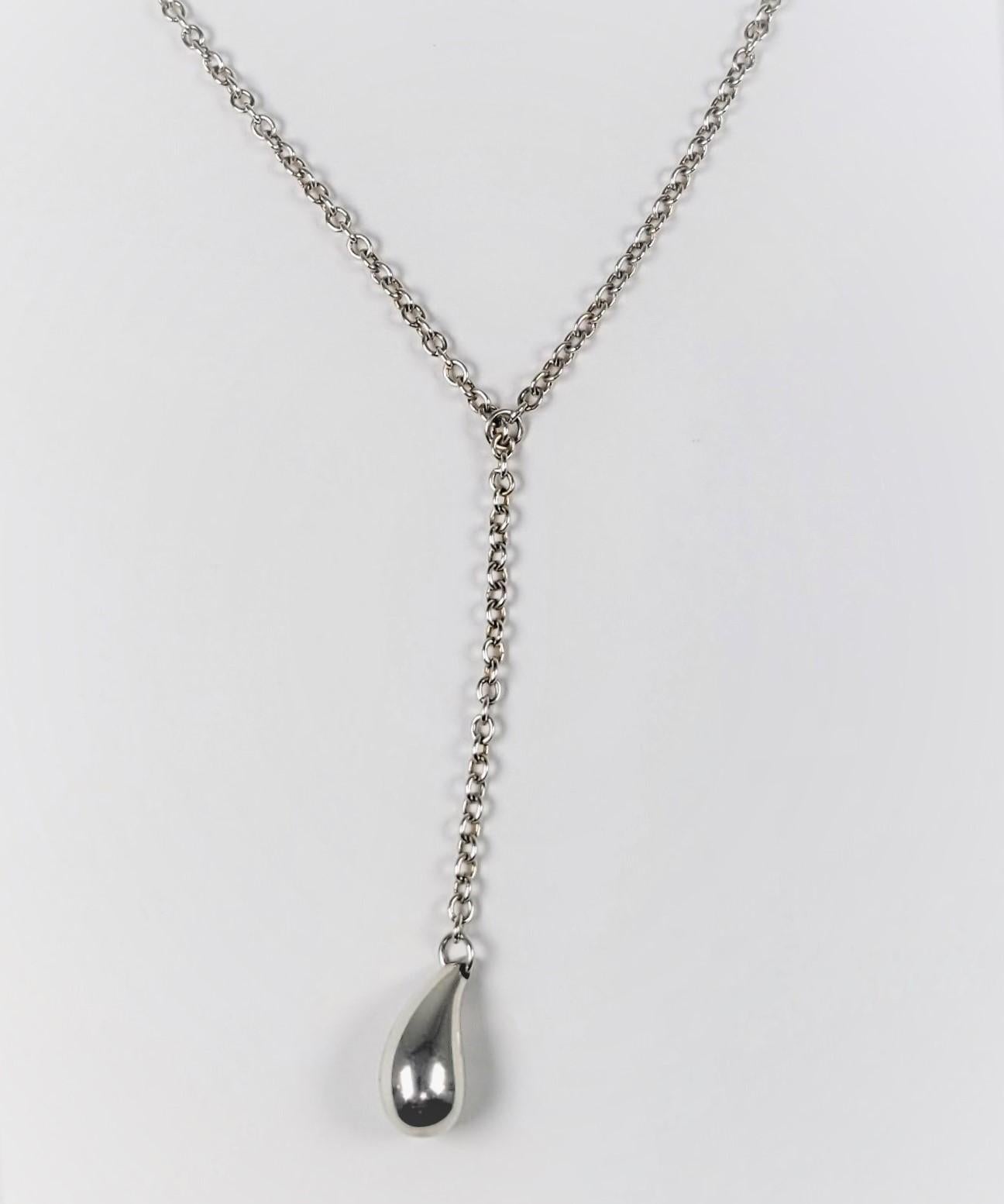 Classic and versatile, this Tiffany and Co. teardrop lariat necklace by Elsa Peretti is the perfect addition to any wardrobe!  This 19 inch necklace is adjustable to different lengths, and is made of sterling silver.  The teardrop is 1.2mm in length.
