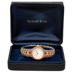 Tiffany & Co. Tesoro 18K Yellow Gold Ruby and Diamond Pavé Bracelet Wristwatch