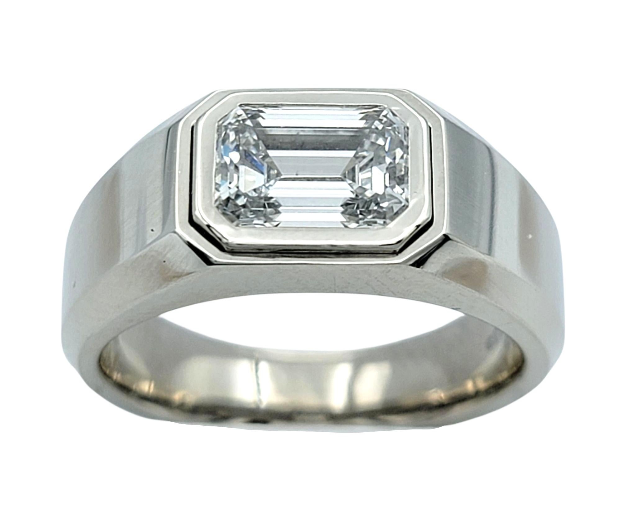 Ring Size: 7.5

A modern icon from Tiffany & Co., stylish engagement ring features a bold octagonal bezel that frames a sleek 1.71 carat rectangular emerald-cut center diamond. The wide, high-polished platinum band enhances the ring’s sculptural