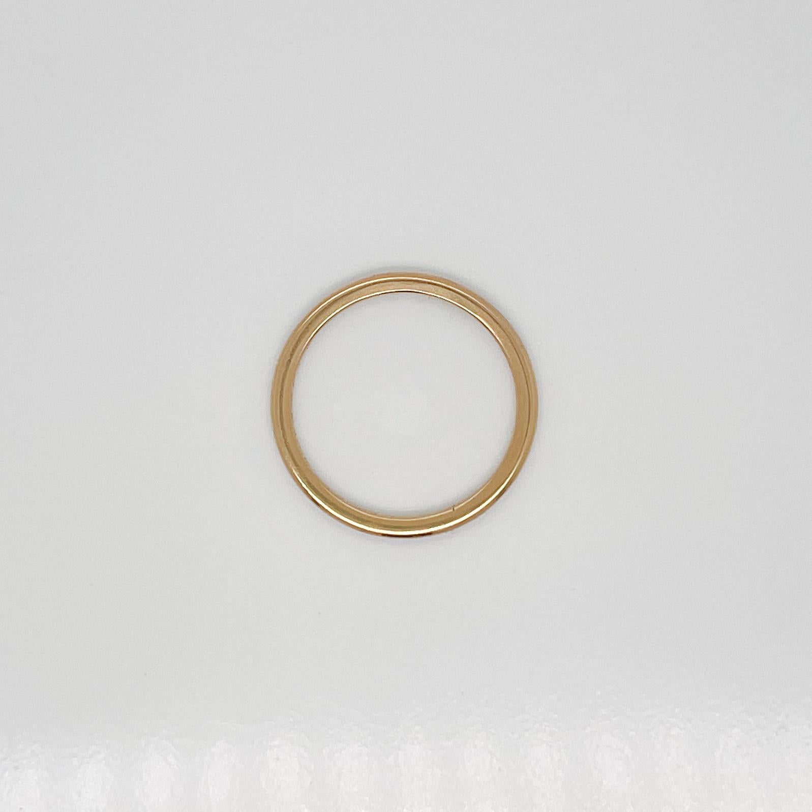 A fine vintage Tiffany & Co. gold ring

By Tiffany & Co.

In 18K gold. 

With an inscription to the interior.

Simply a lovely gold band from Tiffany!

Date:
circa 1952

Overall Condition:
It is in overall good, as-pictured, used estate condition