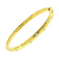 Tiffany & Co. Thin Etoile Bangle in Yellow Gold with Diamonds