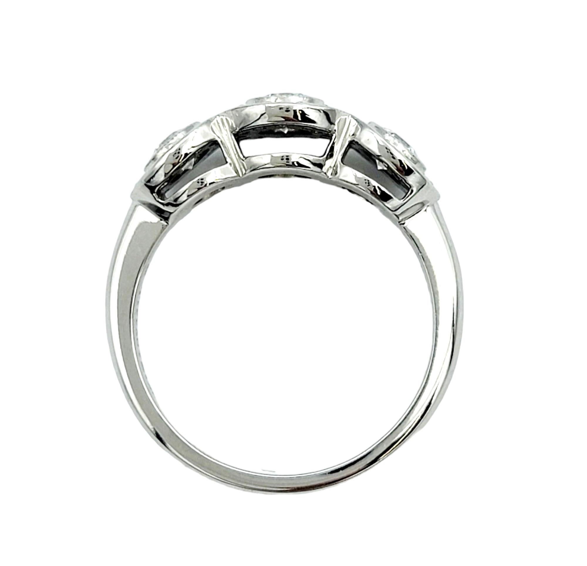 Contemporary Tiffany & Co. Three Stone Circlet Diamond Halo Ring in Platinum Size 4.75 For Sale