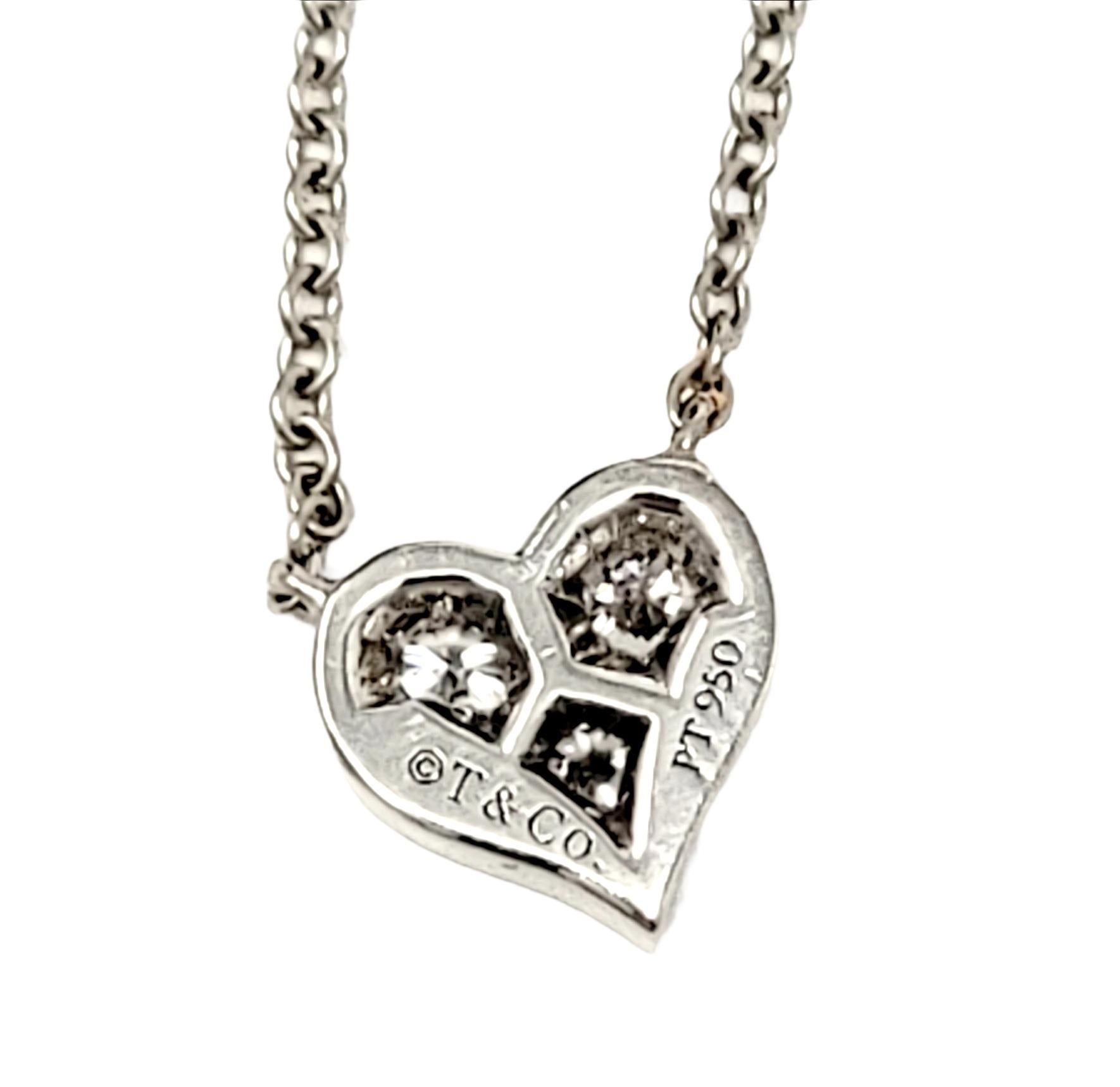 Round Cut Tiffany & Co. Three Stone Diamond Heart Pendant Necklace in Platinum