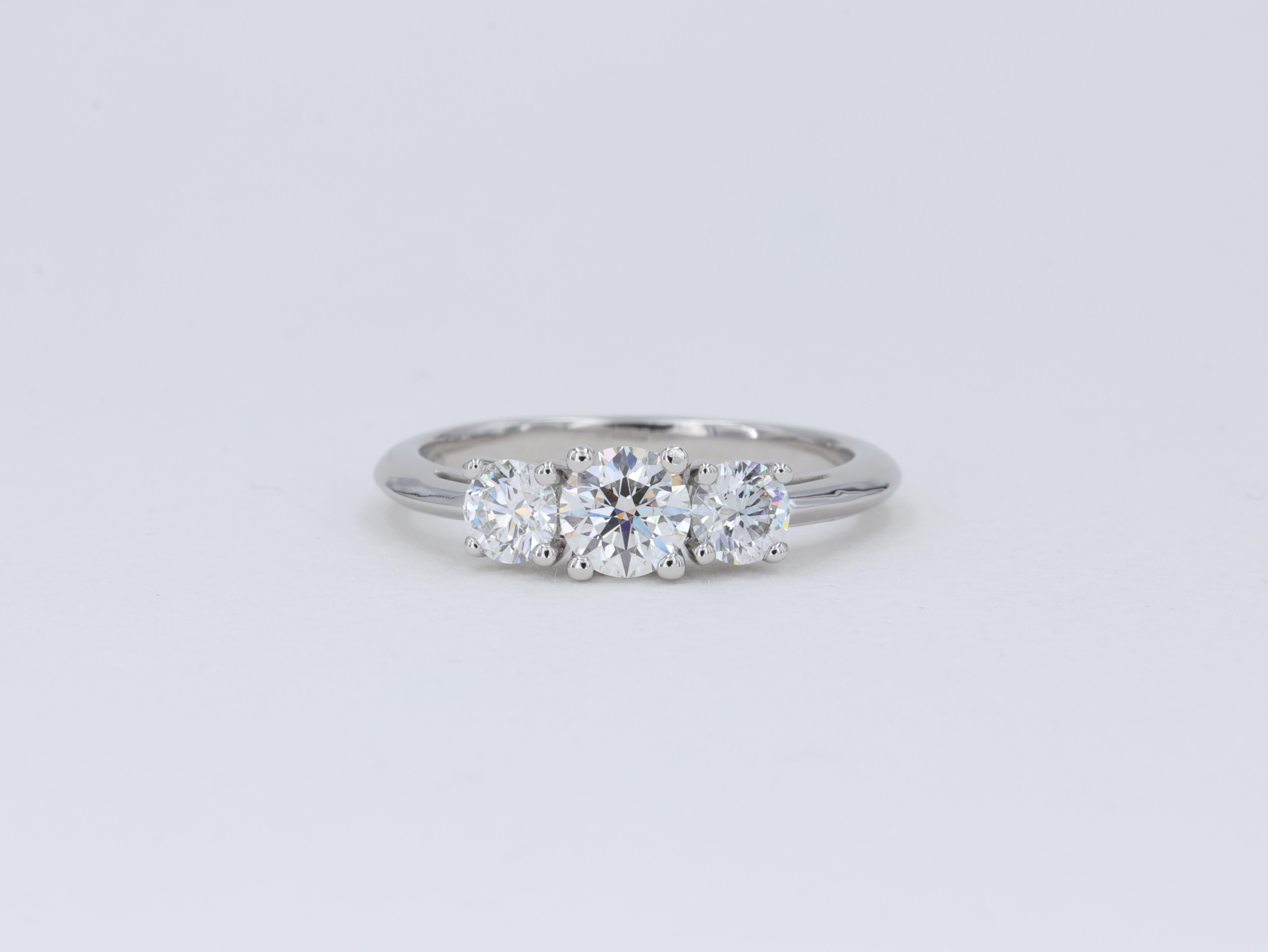 Tiffany & Co. Three Stone Round Brilliant Cut Diamond Platinum Engagement Ring For Sale 3