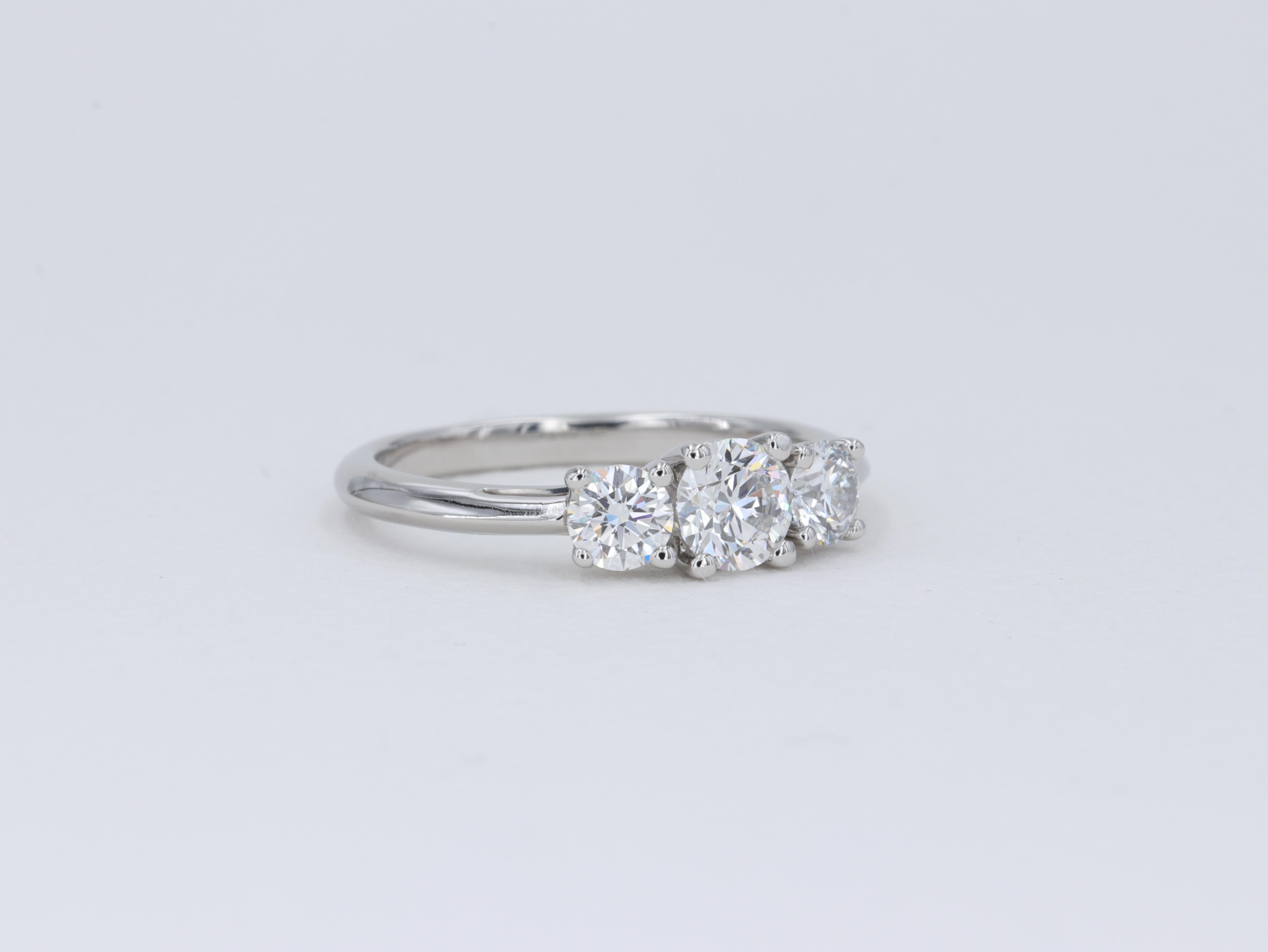 Round Cut Tiffany & Co. Three Stone Round Brilliant Cut Diamond Platinum Engagement Ring For Sale