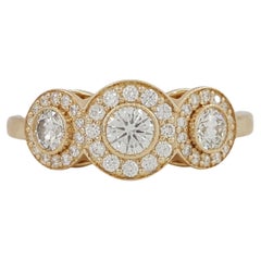 Tiffany & Co. Three-Stone Round Brilliant Diamond Halo Engagement Ring