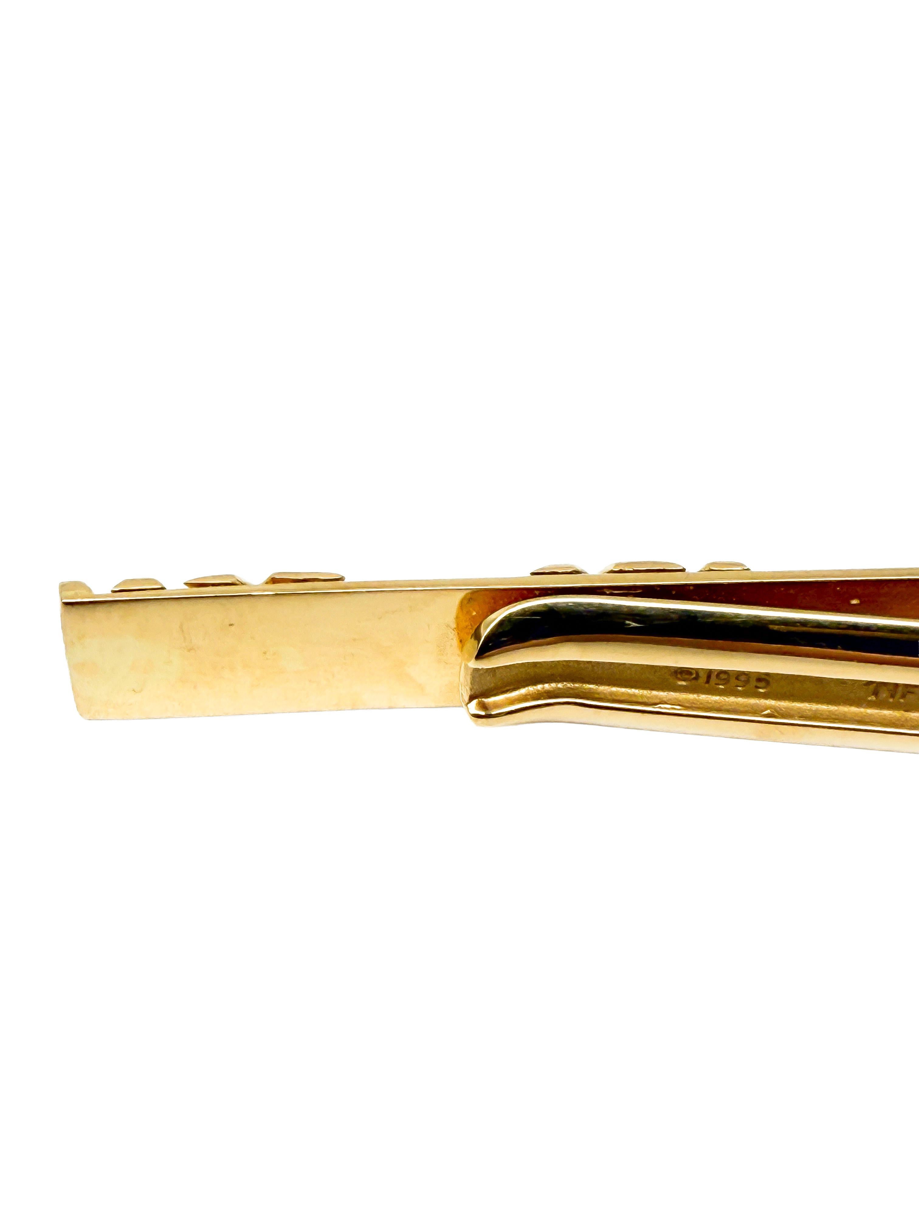 A symbol of classic elegance and timeless craftsmanship: This exclusive tie pin by Tiffany & Co. is far more than just an accessory—it’s a subtle statement of style, quality, and understated luxury. Crafted from fine 18 karat yellow gold and