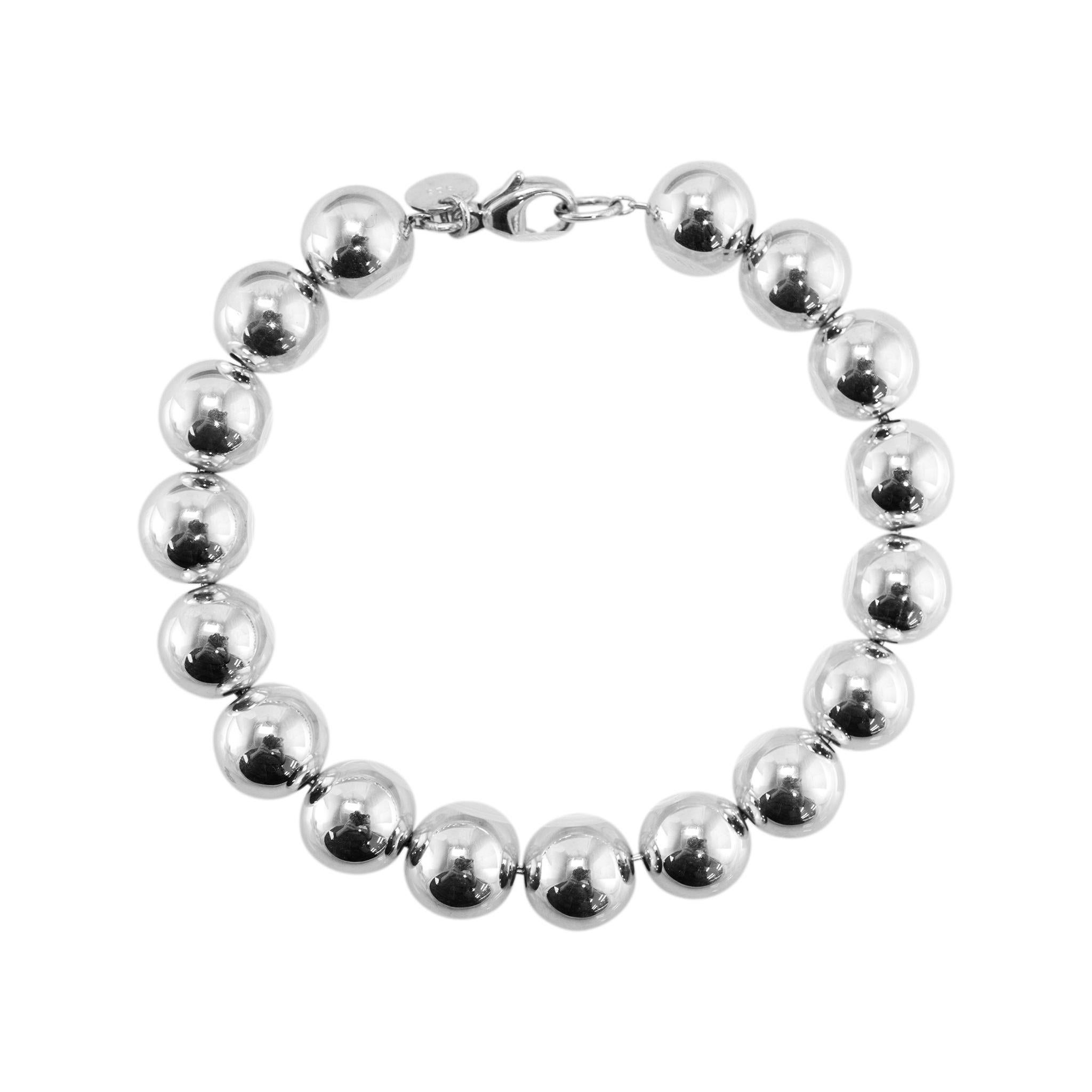 Marca: Tiffany & Co.

Sexo: Mujer

Tipo de metal: 925 Pulsera Ball

Longitud: 7,00 pulgadas

Anchura: 10,00 mm

Peso: 18,72 gramos. 

TIFFANY & CO. Pulsera de plata de diseño, de cuentas y de eslabones.  Grabado con 