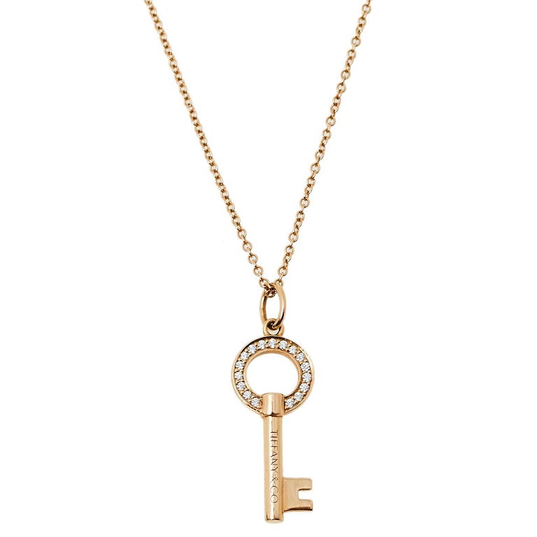 Radiating hope and optimism and symbolizing a bright future, the Tiffany keys from Tiffany & Co. are much loved and instantly recognizable. This necklace, featuring the iconic key pendant, comes crafted from 18K two-tone gold. It is detailed with a