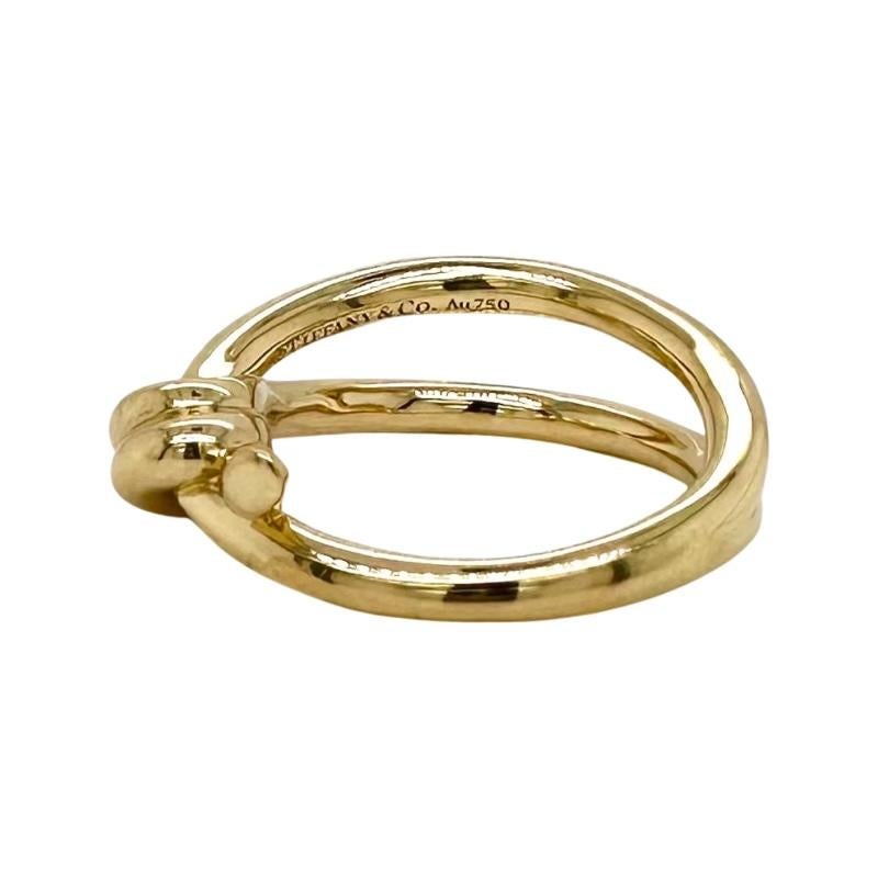 Designer: Tiffany & Co.

Collection: Knot

Metal: Yellow gold

Metal purity: 18k

Size: 8 US

Hallmarks: Tiffany & Co., Au750

Includes: Tiffany & Co. Original box
                24 Months warranty with Brilliance Jewels