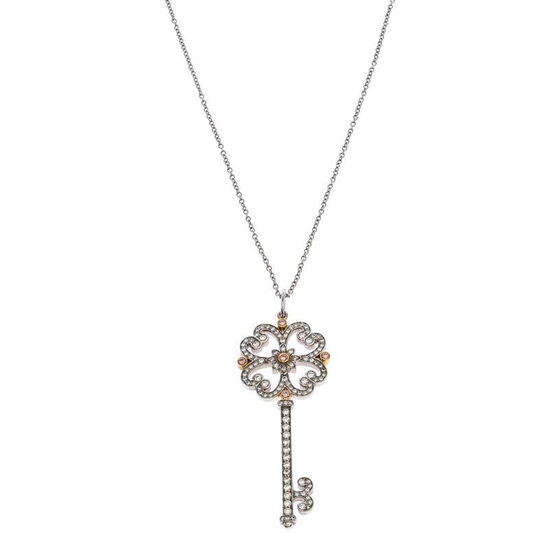 Contemporary Tiffany & Co. Tiffany Platinum & 18K Gold Quatra Heart Key Pendant Necklace