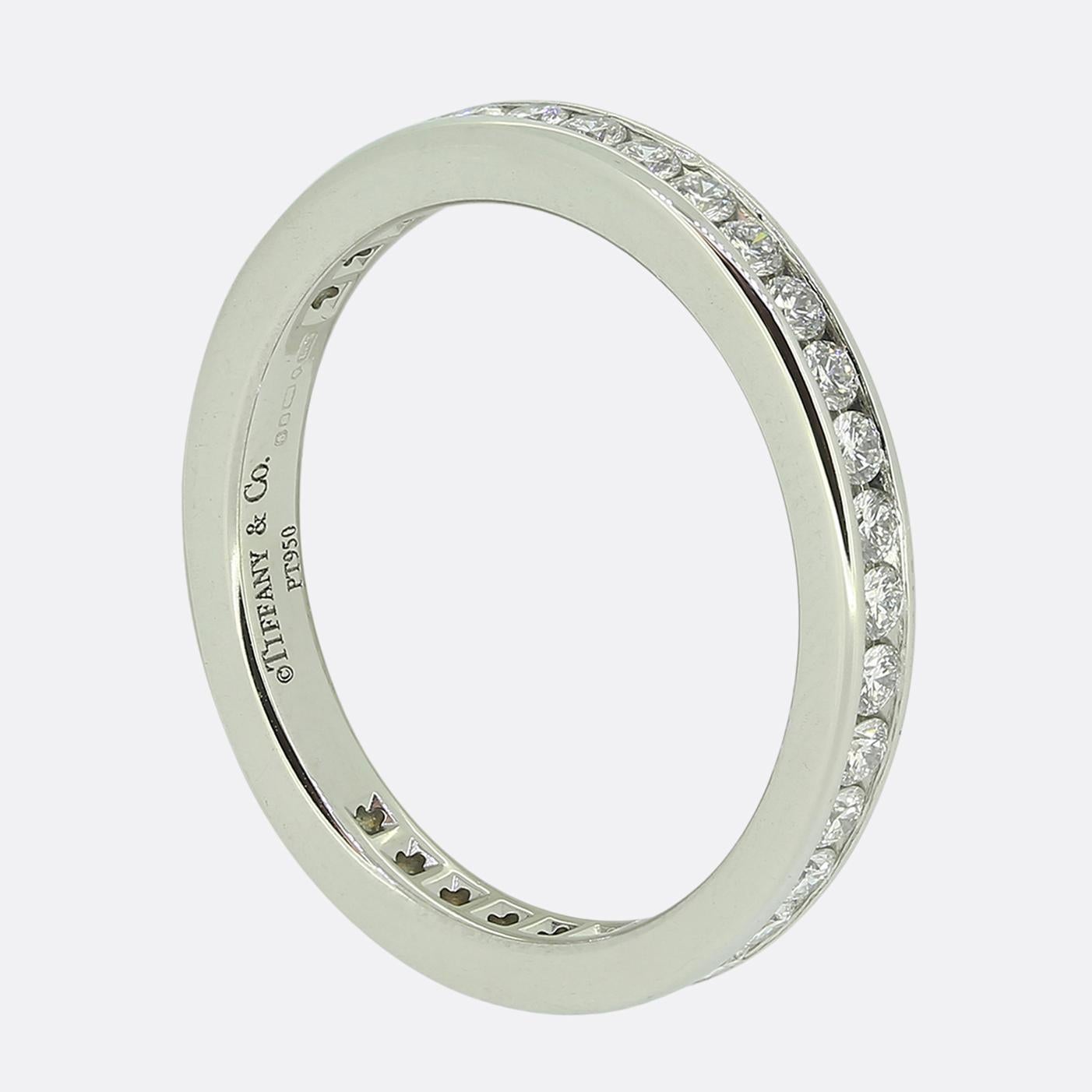 Here we have a Tiffany® Setting wedding band which has been expertly crafted in platinum with a full circle of round brilliant diamonds in a channel setting. It's beautiful worn on its own, or paired with a Tiffany engagement ring.

Condition: Used