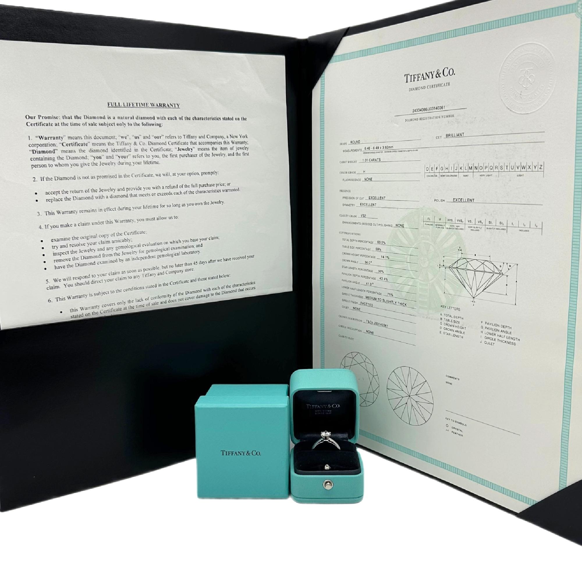 Tiffany & Co. Tiffany Setting Round Diamond Engagement Ring
Style:  Solitaire
Ref. number:  24334066 / J03140361
Metal:  Platinum
Size:  5 sizable
Measurements:  2 mm
Main Diamond:  1.01 cts
Color & Clarity:  H, VS2
Crown Inscription: 