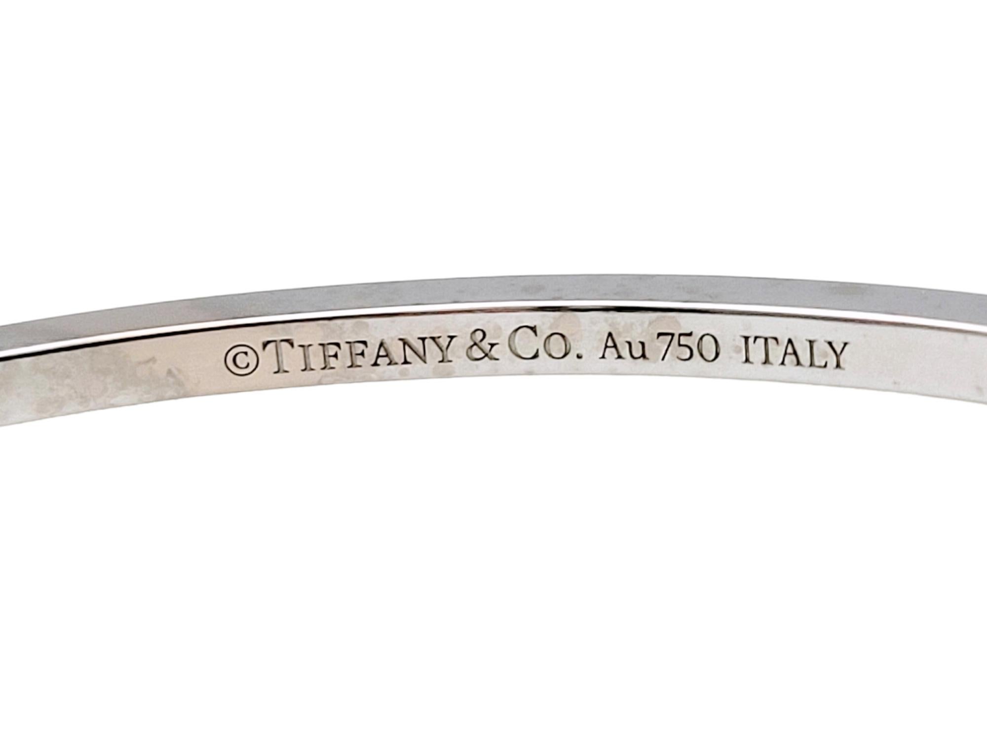 Round Cut Tiffany & Co. Tiffany T Diamond Hinged Wire Bangle Bracelet in 18k White Gold For Sale