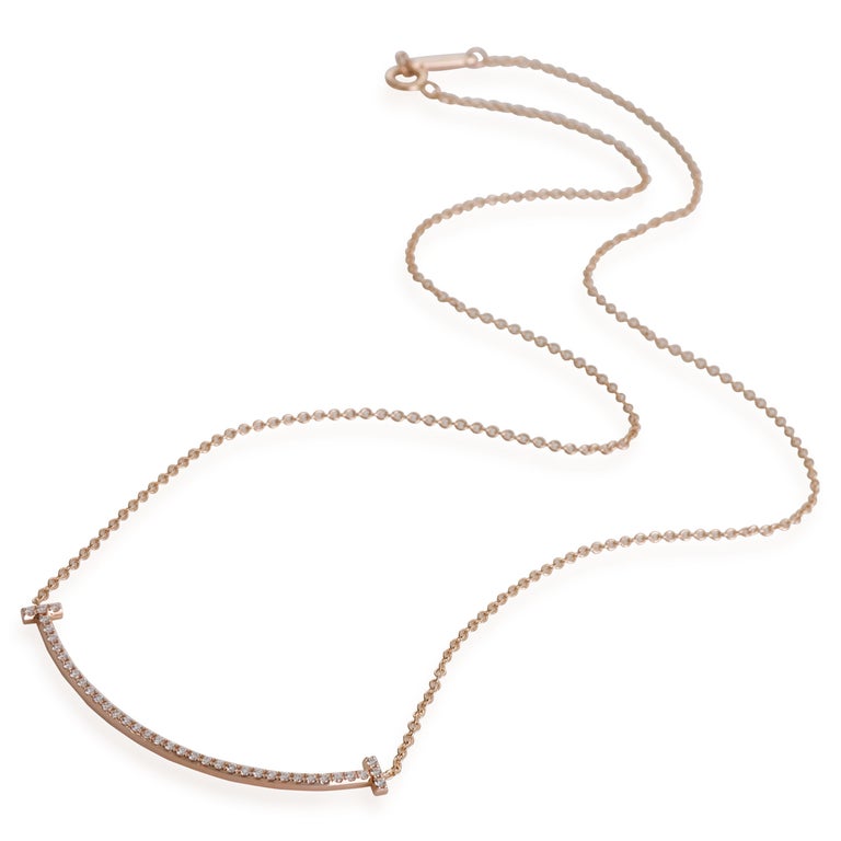 Tiffany & Co. Tiffany T Diamond Smile Necklace in 18k Yellow Gold 0.1 CTW

PRIMARY DETAILS
SKU: 119108
Listing Title: Tiffany & Co. Tiffany T Diamond Smile Necklace in 18k Yellow Gold 0.1 CTW
Condition Description: Retails for 2500 USD. In excellent