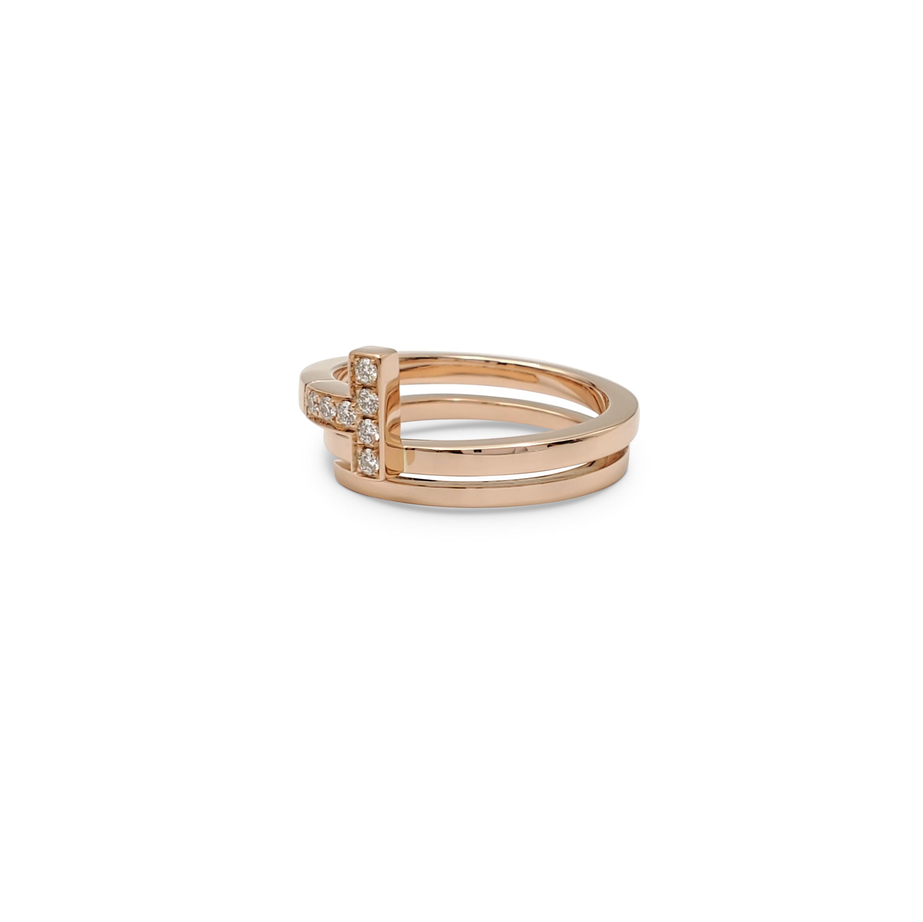 Authentic Tiffany & Co. 'Tiffany T' square wrap ring crafted in 18 karat rose gold and accented with an estimated 0.10 carats of high quality (E-F color, VS clarity) round brilliant cut diamonds. Signed T&Co., Au750, Italy. Ring size 6. The ring is